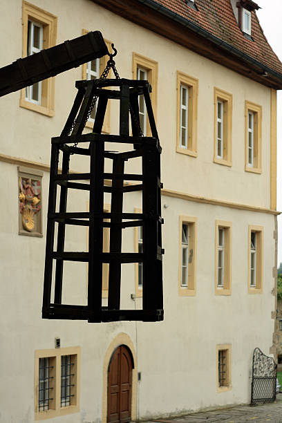 Medieval steelcage in Rothenburg - Germany in front of the \