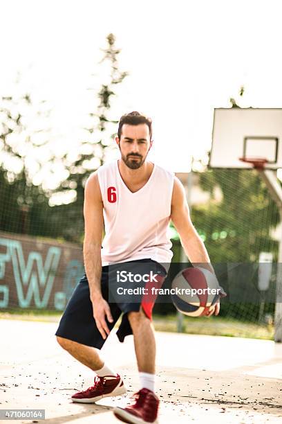 Basketball Player On The Court Stock Photo - Download Image Now - 20-29 Years, 2015, 30-39 Years