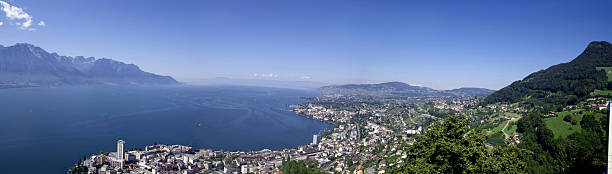 Panorama of the "Riviera Vaudoise" and Lake Leman Panorama of the "Riviera Vaudoise" and Lake Leman. At the bottom we can see the town of Montreux (into which take place every year the famous "Montreux Jazz Festival") and more in the bacground Vevey (worldwide headqueaters of Nestle). On the left we can see the Alps. Obviously the lake is the Leman one (called also lake of Geneva). The picture was taken from Glion, a small twon over Montreux in the direction of South-West. montreux photos stock pictures, royalty-free photos & images