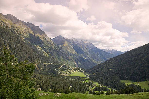 Panoramic view across Senderstal valley at the mountains behind Zirl village in Austria