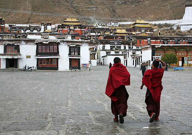 Monks Walking In Tashilhunpo Monastery stock photo