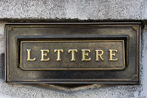 Bronze mailbox with italian word "Mail".