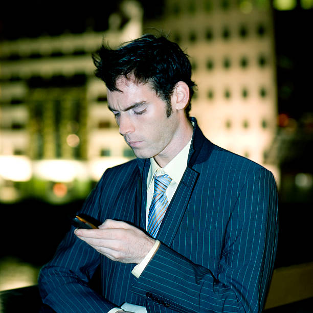 istock Businessman on Cell Phone 471063545