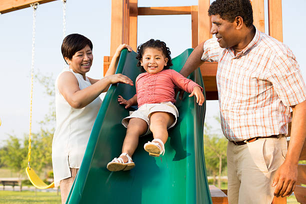 istock Playful grandparents with granddaughter 471063656
