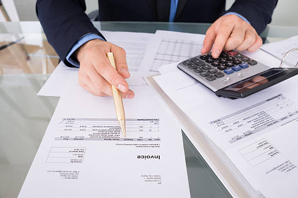 istock Businessman Calculating Invoices 471064146