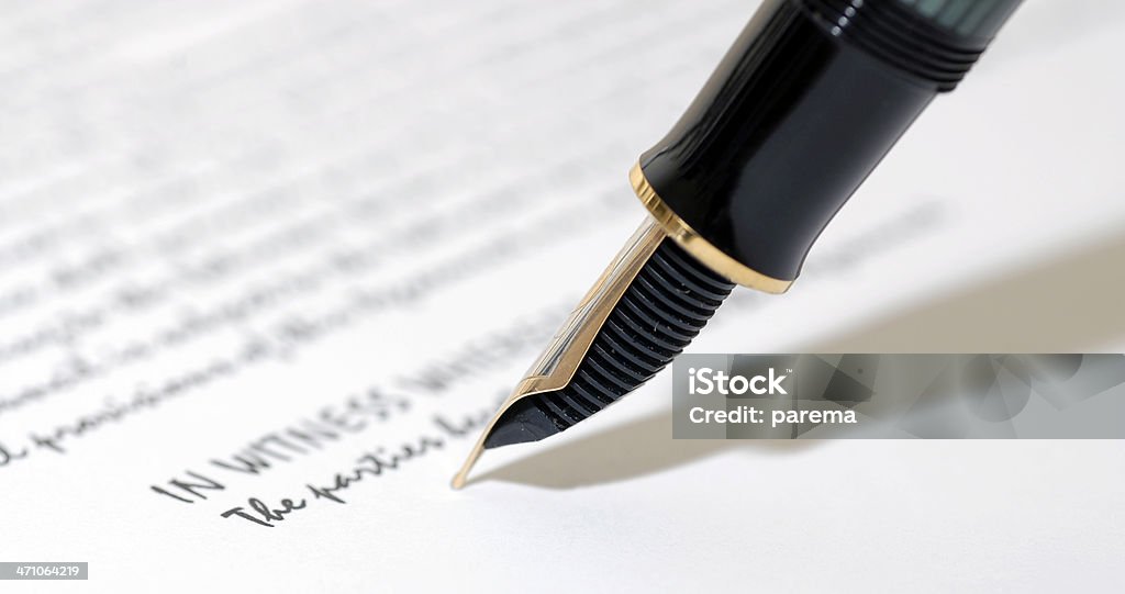 Signing a contract Fountain pen before signing the contract.Ideas and concepts.  Shorthand Stock Photo