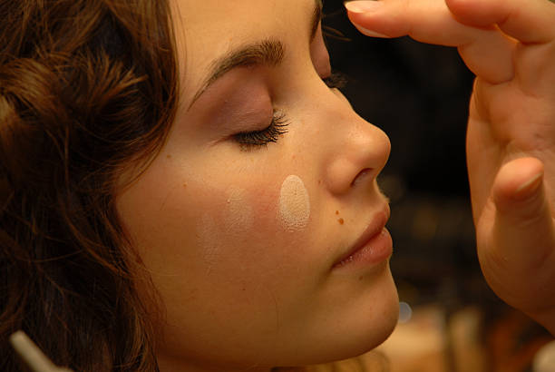 istock Girl and make up artist. 471064501
