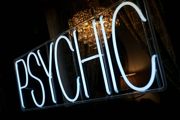 psychic accedi al neon bianco con chandellier - sayings business aspirations magic foto e immagini stock