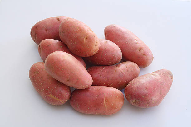 red ziemniaki - raw potato human skin red pink zdjęcia i obrazy z banku zdjęć