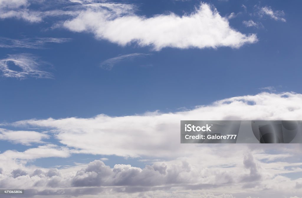 Layers of White Clouds against Blue Sky Layers of White Clouds against Blue Sky on a Sunny Day within a Square Composition 2015 Stock Photo