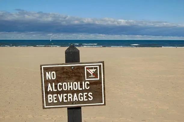 "NO ALCOHOLIC BEVERAGES" sign at Holland State Park, Michigan; shallow DOF