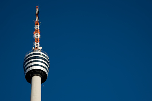 Detail of famous Television Tower, Lookout Tower against deep blue sunny sky with lot of natural sky copy space, Stuttgart, Germany.