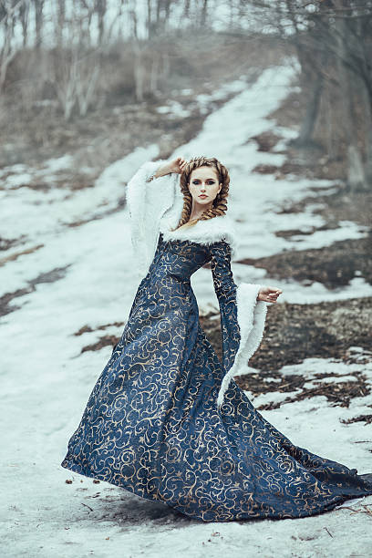 istock The woman on winter walk with a dog 471067848