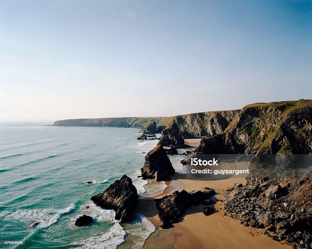 Rocky Coastline View of a rocky coastline in Cornwall (Bedruthan Steps), England. Room for text. Adventure Stock Photo