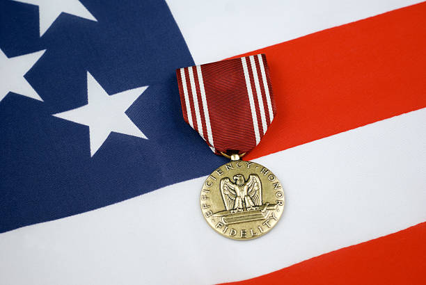 istock Army Good Conduct Medal with American Flag 471069587