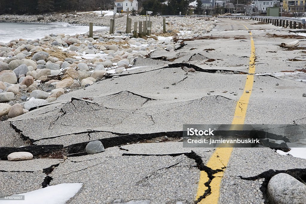 Storm-Wrecked Road series... A winter storm wrecked this beach road. Road Stock Photo