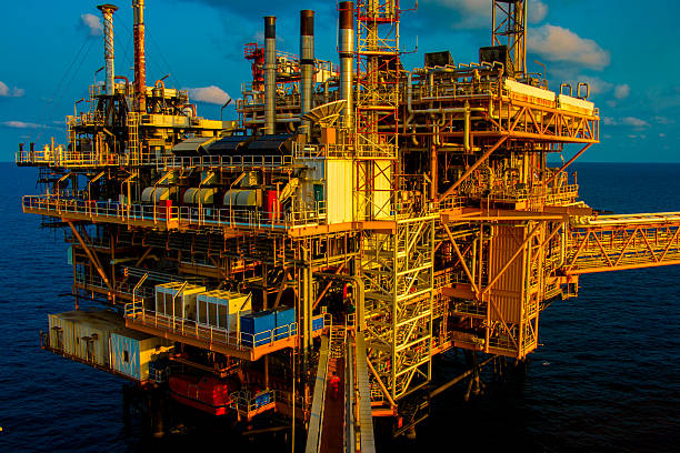 istock Offshore oil and rig platform in sunset or sunrise time. 471071290