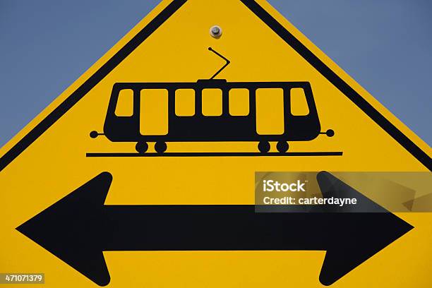 Tram Or Trolley Crossing Look Both Ways Stock Photo - Download Image Now - Alertness, Arrow Symbol, Black Color