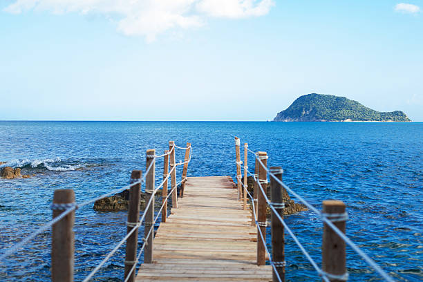 istock wooden bridge - sea, summer. 471072442