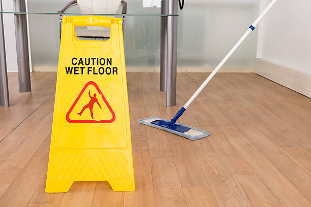istock Wet Floor Sign And Mop 471072484