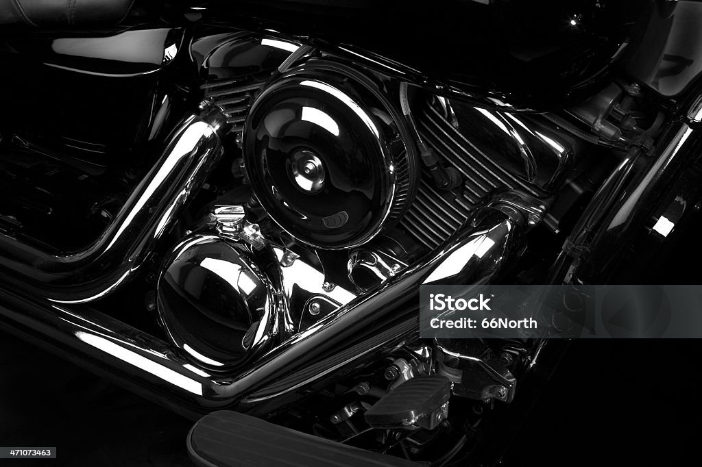 V-Twin A close-up/high angle on a V-Twin motorcycle engin with a lot of chrome.  High contrast, artistic rendering.  Selective focus. Motorcycle Stock Photo