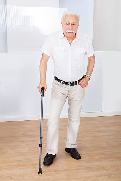 istock Portrait Of Senior Man With Walking Stick 471074362