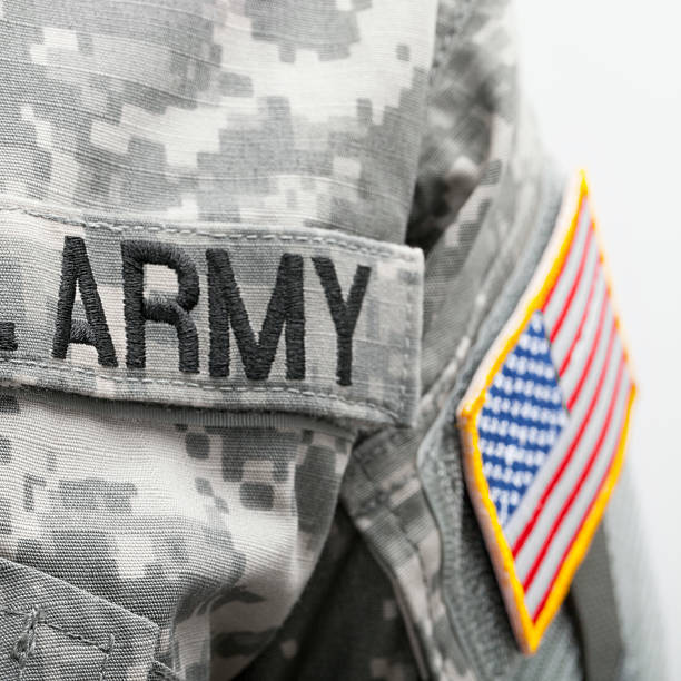 istock USA flag and U.S. Army patch on solder's uniform 471074974
