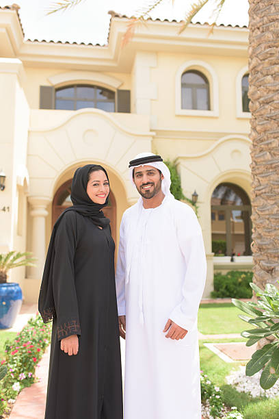 istock Young outside their luxury Dubai Villa 471075260