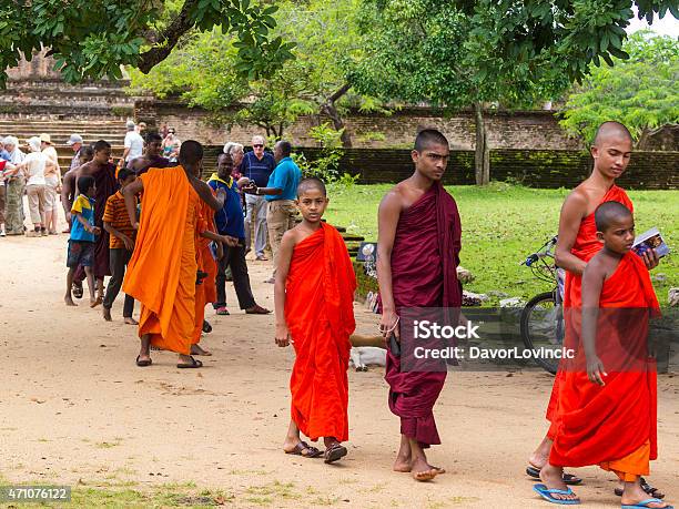 Young Monks Walking At Polonnaruwa Ruins In Sri Lanka Stock Photo - Download Image Now