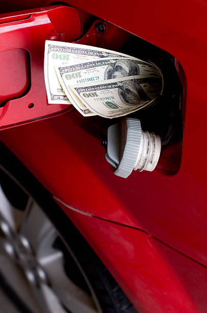 gas de dinero - currency odometer car gasoline fotografías e imágenes de stock