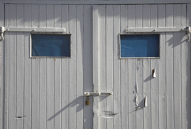 istock Blue eyed door looking like a human square face 471078177