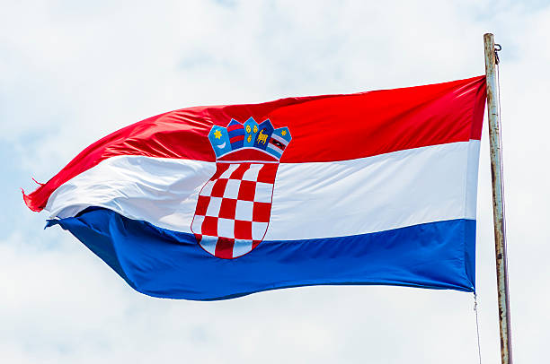 istock Emotional waving Croatian flag on rusty flagpole 471078240
