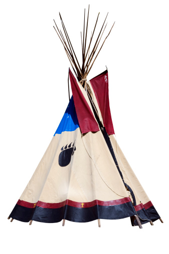 rainbow-coloured tepee set up in the garden, early spring, traditional Indian dwelling