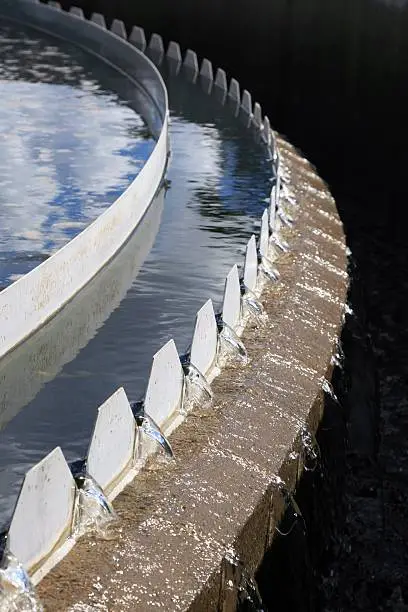 Saw Tooth Weir of a clarifier tank at a Water Treatment Plant – blurs into background. Click to see more...