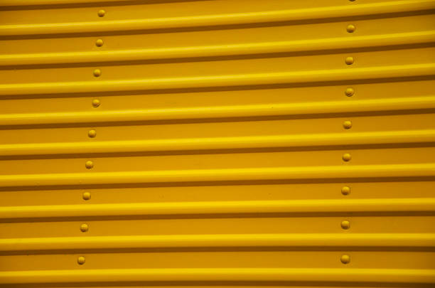 istock Yellow painted corrugated steel 471079002