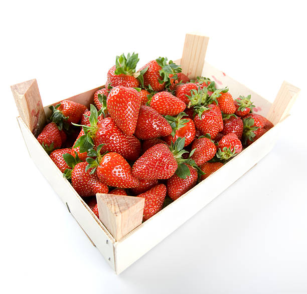 istock Fresh strawberries in box, isolated on white background 471079049