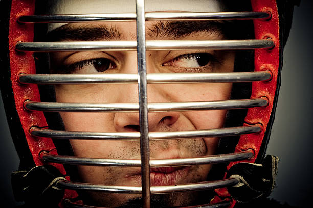 istock Man in kendo helmet 471079119
