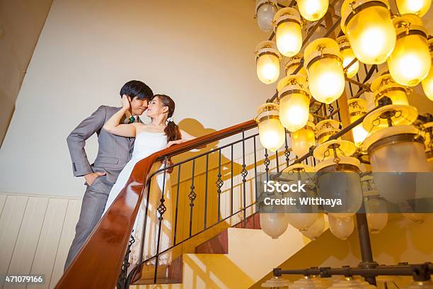 Beautiful Asian Young Bride And Groom Kissing Stock Photo - Download Image Now - 2015, Adult, Architecture