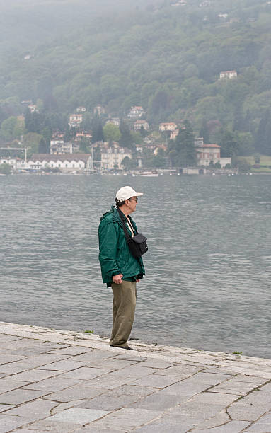 Senior man at dock stock photo