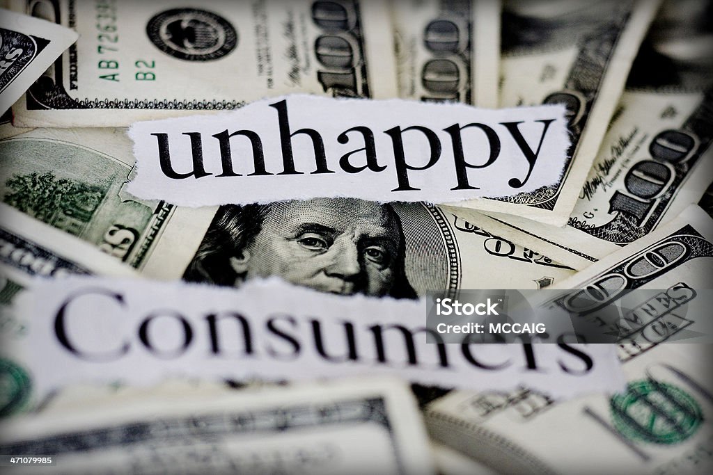 unhappy consumers Hundred dollar bills with the words "unhappy consumers." Accidents and Disasters Stock Photo