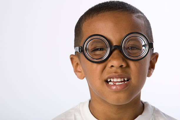 istock Confused Mixed Race Boy Can't See Out of Glasses 471081027