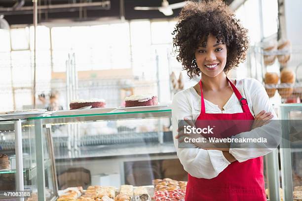Pretty Employee Posing With Arms Crossed Stock Photo - Download Image Now - Bakery, Owner, Women