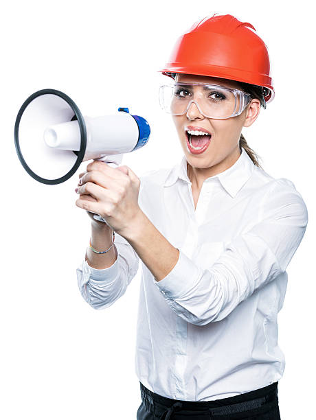 istock girl in a hard hat 471083260