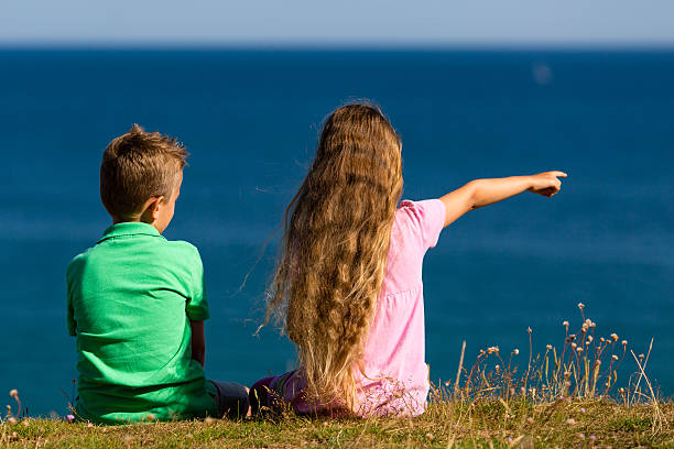 istock Boy and girl during summer time 471085772