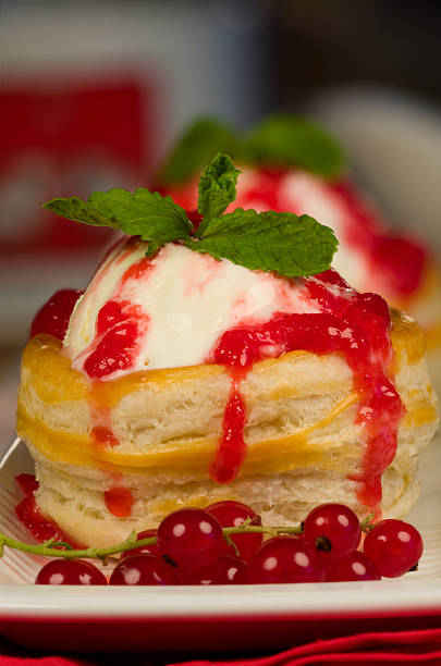 istock Ice cream dessert and red currants dressing 471087127