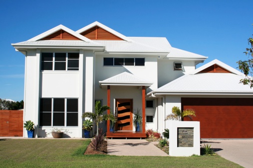 Modern family home with clear blue sky. Click to see more...