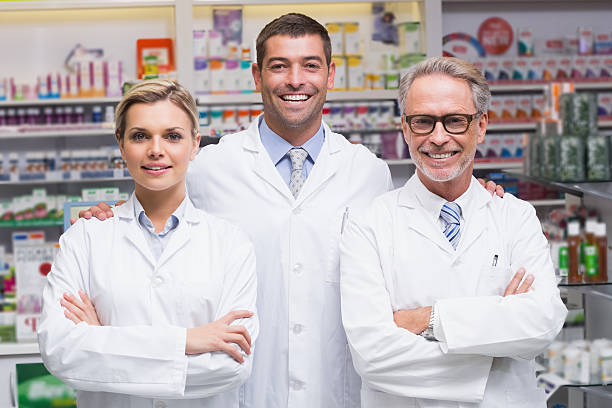 istock Team of pharmacists smiling at camera 471088330