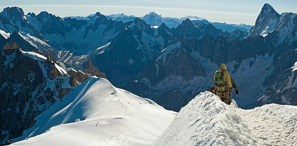 istock Mountaineers on snowcapped summit 471089669