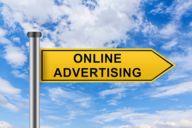 istock yellow road sign with online advertising words 471090506