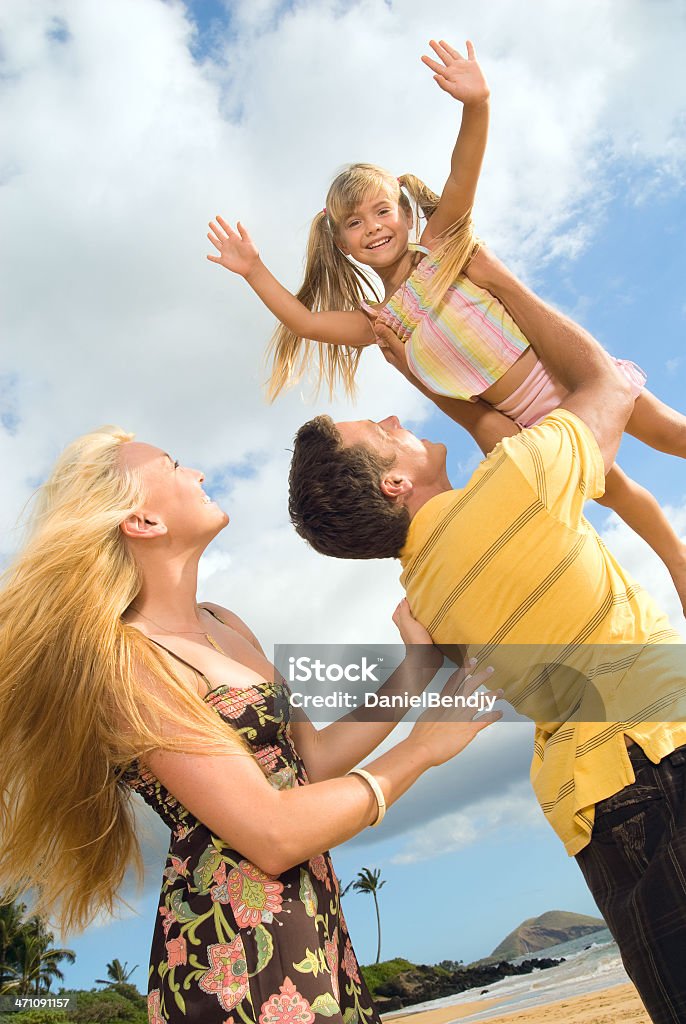 Family Vacation. A young happy family portrait.  4-5 Years Stock Photo